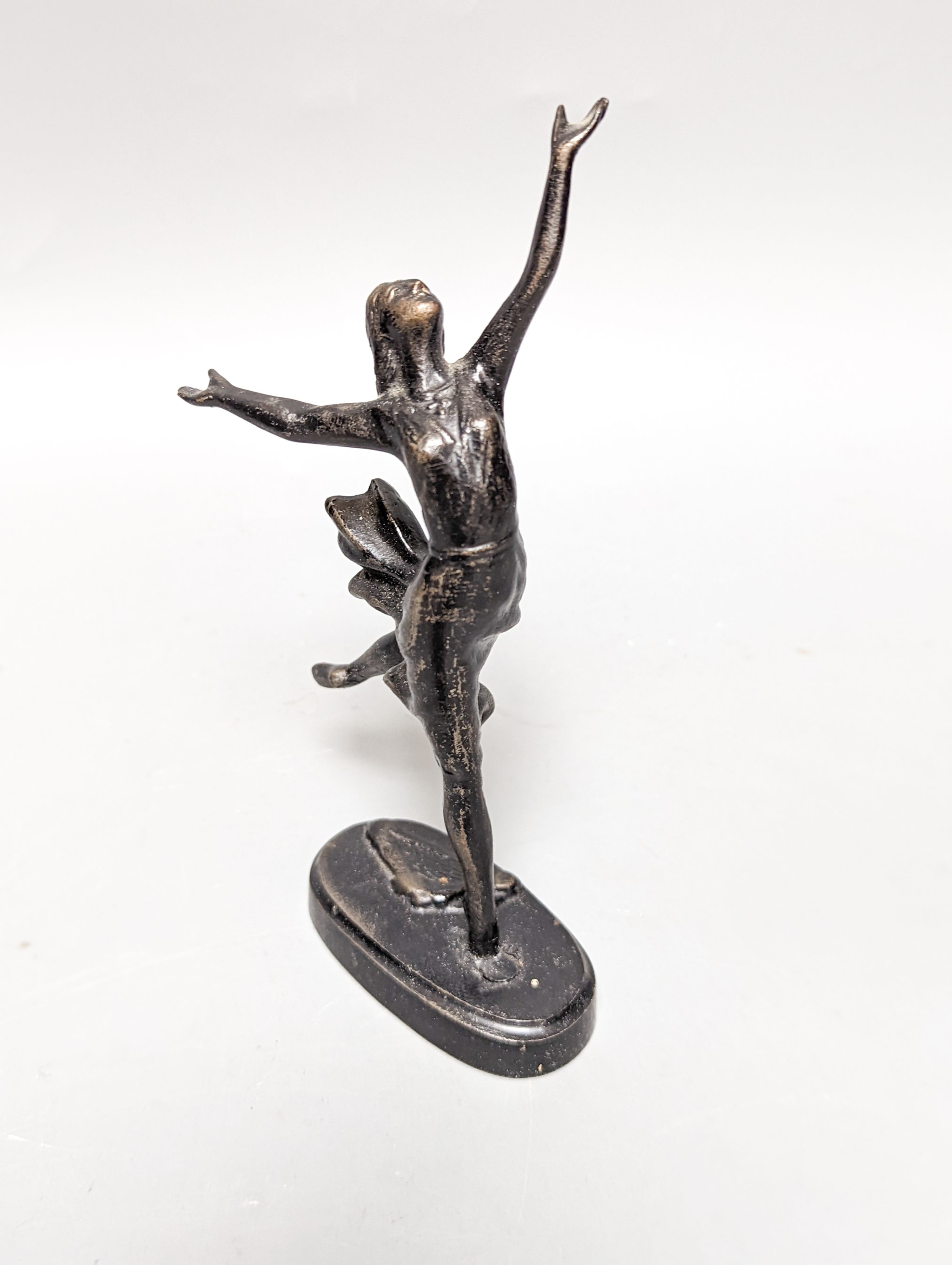 A WMF pewter teapot, an early 20th century bronze of Venus with dolphin, 2 other figures and a WMF style figural desk stand 36cm